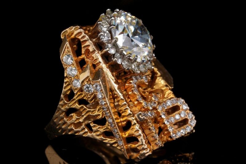 A gold and diamond TCB (Taking Care of Business) ring worn by the late Elvis Presley is seen in an undated handout photo ahead of an auction to be held on November 28, 2020, in Los Angeles, California, U.S. Courtesy of GWS Auctions/Handout via Reuters